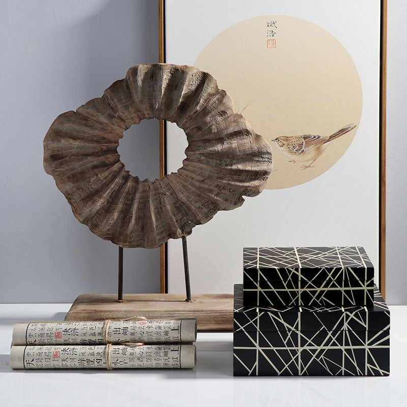The Hand-Carved Solid Wood Sculptural Decor, paired with two black and gold decorative boxes, two Chinese character scrolls, and a bird calligraphy artwork, adds elegant style to your home.